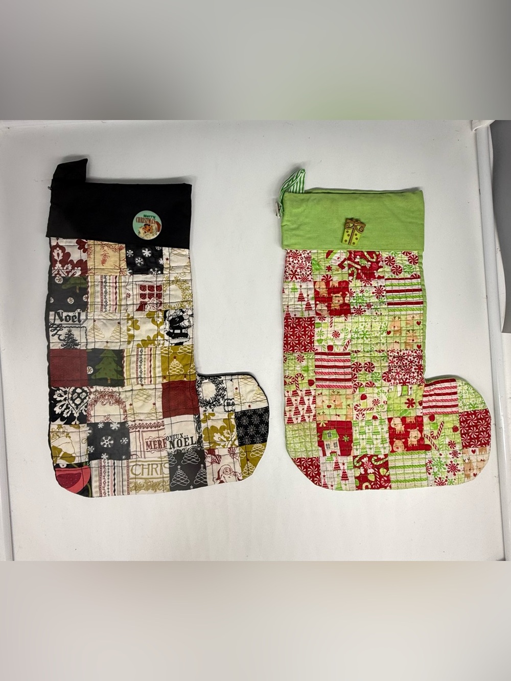2 vintage quilted patchwork Christmas stockings handcrafted with festive fabrics